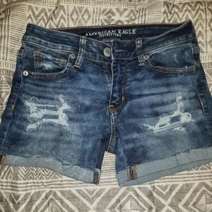 AE distressed mid stretch shorts